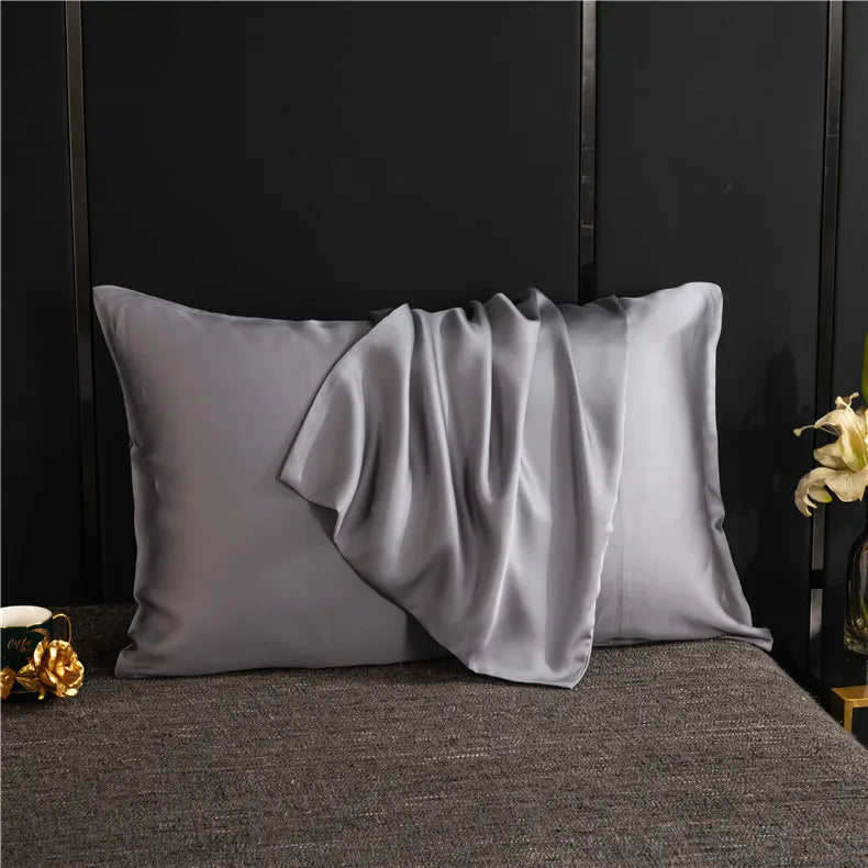 Détail de la fermeture enveloppe invisible TAIT D4OREILLER ESSENCE ET SOIE GRIS