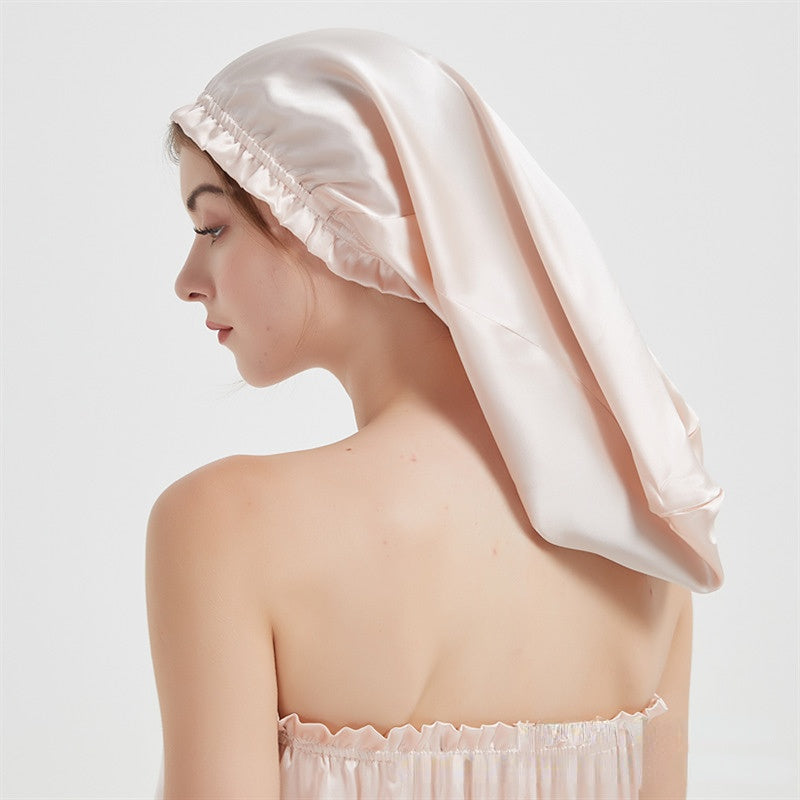 Bonnet de nuit en soie pour cheveux épais rose pale