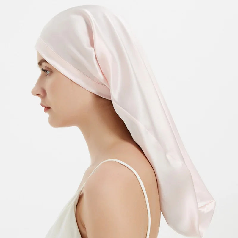 Bonnet de sommeil en soie rose avec ajustement pour cheveux longs vue coté