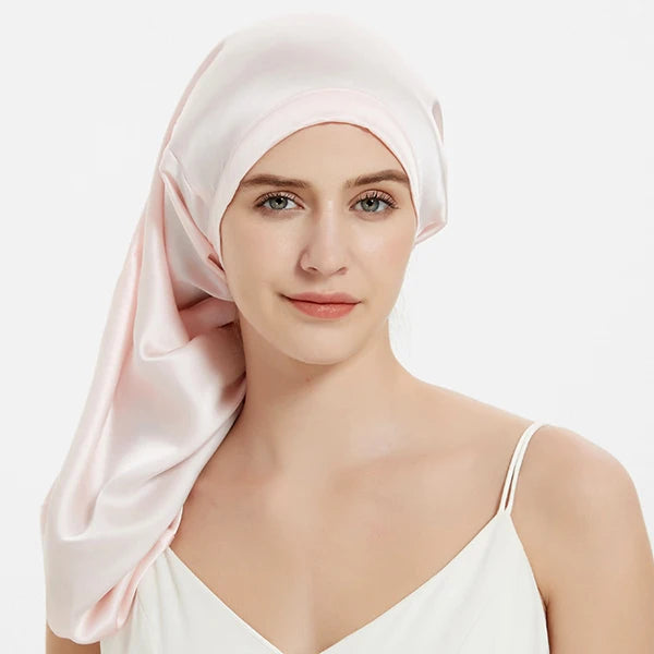 Bonnet de sommeil en soie  avec ajustement pour cheveux longs rose pale 