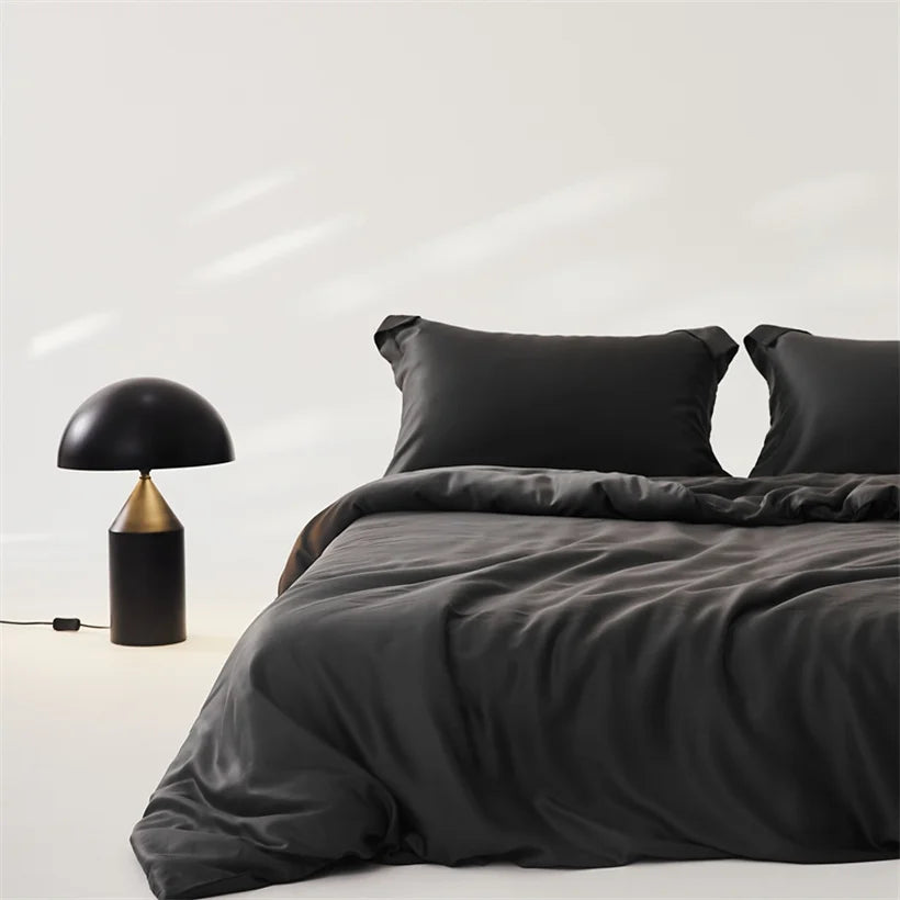 Chambre élégante avec housse de couette en soie noir