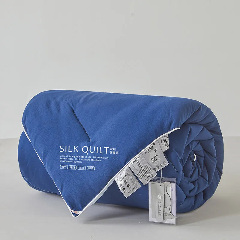 Couette respirante adaptée été et hiver bleu