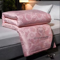 Couette d’hiver luxe pour lit en soie de mûrier rose 