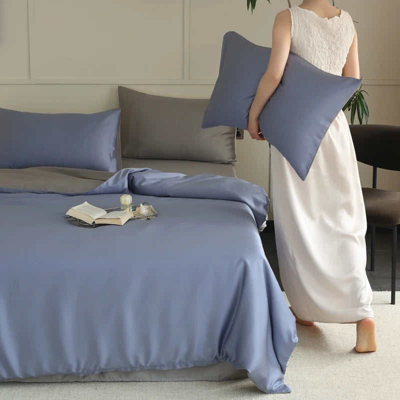 Décoration de chambre haut de gamme avec linge de lit en soie bleu et gris