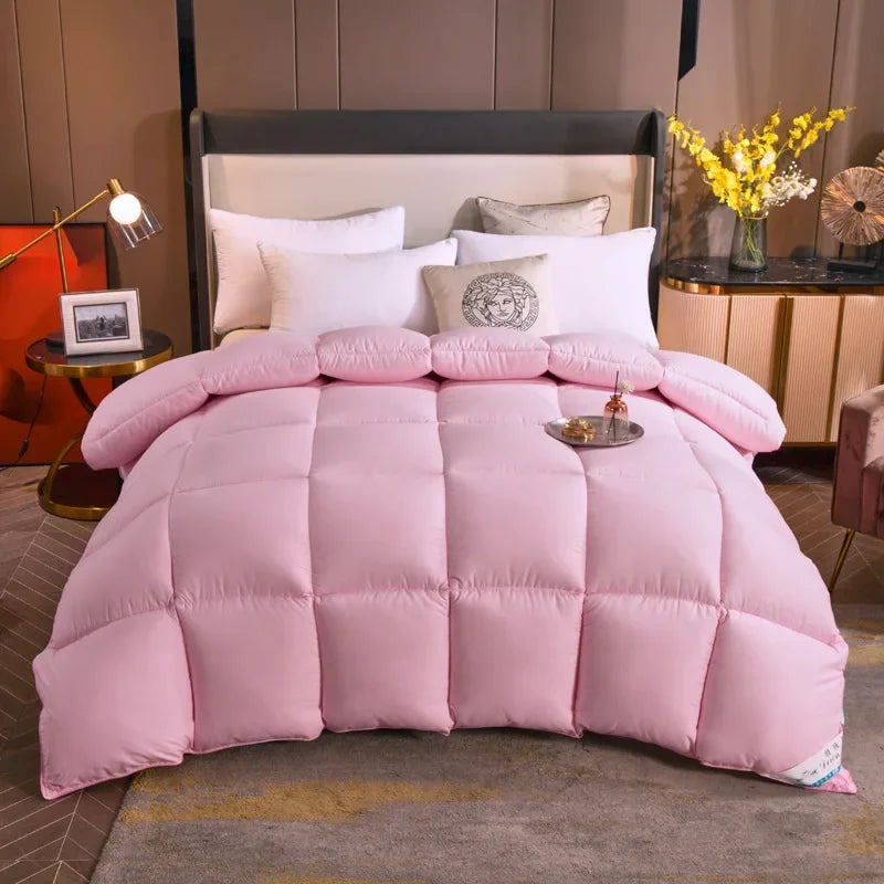 Lit Super King équipé d’un duvet en plumes d’oie rose