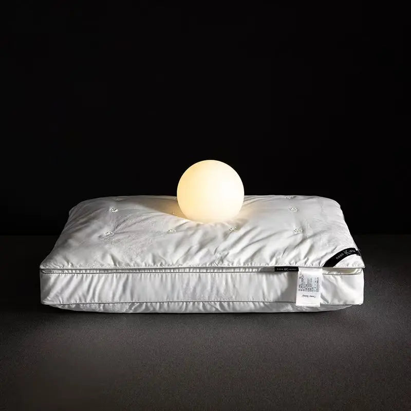 oreiller en soie ferme anti acarien hypoallergénique essence et soie