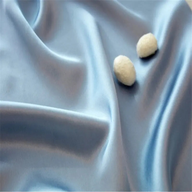 Traversin protégé par une housse en soie 16 momme